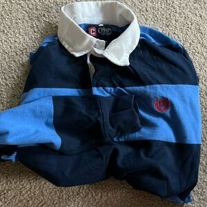 Collared long sleeve striped polo shirt.  Blue striped. Size medium youth.